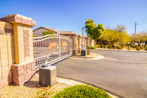 Skilled technician from 1st Gate Repair Dallas repairing an automatic gate opener. 